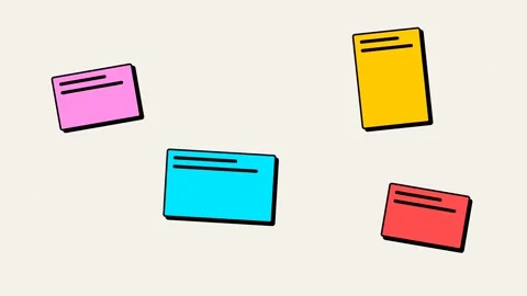 Four colorful sticky notes arranged randomly on a clean white background Video stock 335117964