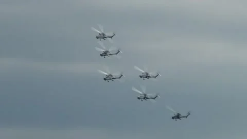 Four combat helicopter Mi-28N, night hunter (Havoc) perform group aerobatics. Stock Footage 134032545