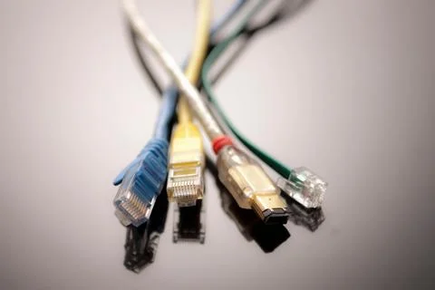 Four computer cables, close up Stock Photos