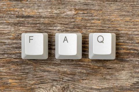 Four computer keyboard keys arranged to spell FAQ word 스톡 사진