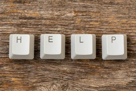 Four computer keyboard keys arranged to spell HELP word Four computer keyb... Stock-Fotos