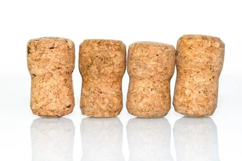 Four corks ref Stock Photos