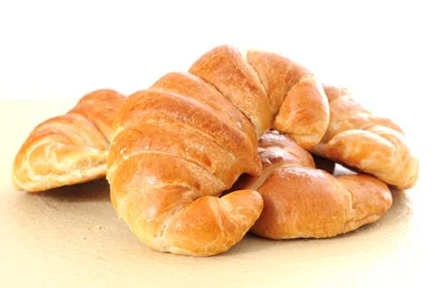 Four croissant Stock Photos