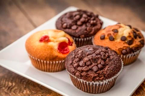 Four cupcakes Stock Photos