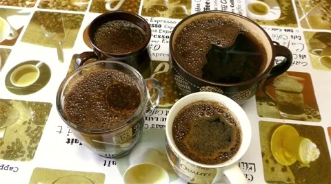 Four Cups With Hot Coffee Stock Footage 67895380