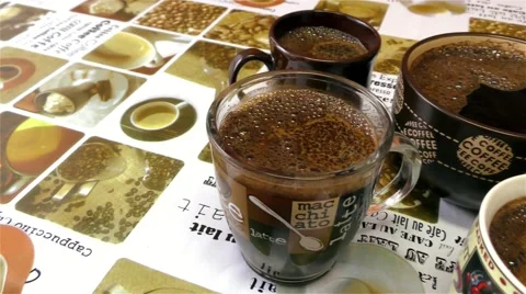Four Cups With Hot Coffee Stock Footage 67895471