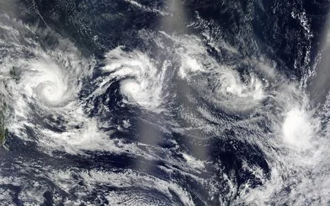 Four cyclones. View from space. Elements of this image are furnished by NA... Stock Photos