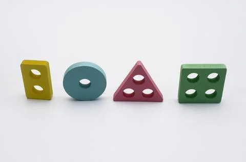 Four different geometric shapes - triangle, square, circle, rectangle. conc.. Stock Photos