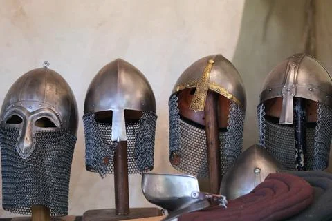 Four different medieval style helmets Stock Photos