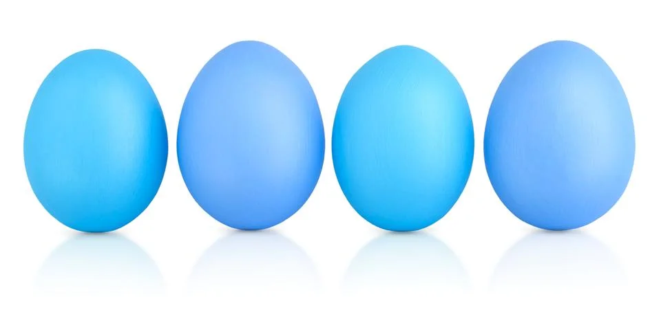 Four Easter eggs painted blue color. Monochrome minimalist isolated eggs with Foto stock