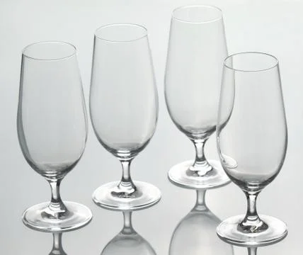 Four empty glasses Foto stock