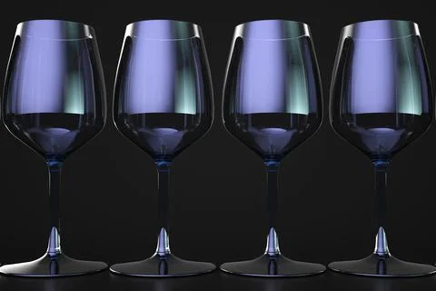 Four empty wine glasses. Dark background. Stock Photos