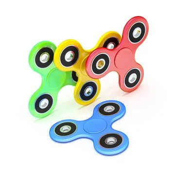 Four fidget spinner in different colors 3d rendering of four fidget spinne... Stock Photos