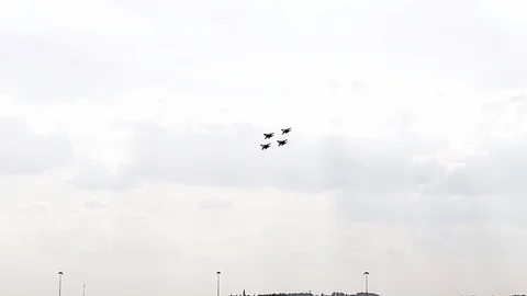 Four fighter jets in the blue sky. A general plan. Aerobatic figures. Airshow Stock Footage 124143013