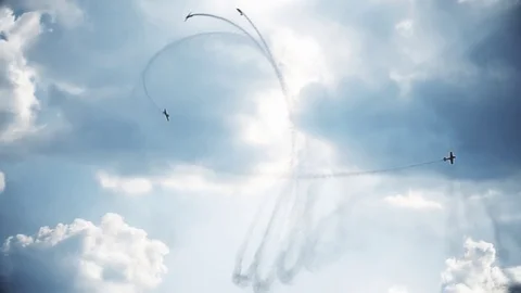 Four fighter jets in the blue sky. A general plan. Aerobatic figures. Airshow Stock Footage 124143192