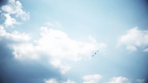Four fighter jets in the blue sky. A general plan. Aerobatic figures. Airshow Stock Footage 124143282
