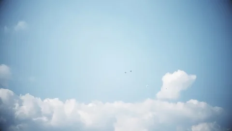 Four fighter jets in the blue sky. A general plan. Aerobatic figures. Airshow Stock Footage 124143526