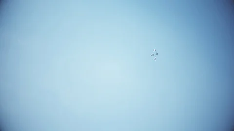 Four fighter jets in the blue sky. A general plan. Aerobatic figures. Airshow Stock Footage 124143662