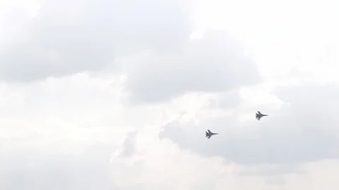 Four fighter jets in the blue sky. A general plan. Aerobatic figures. Airshow Stock Footage 124145937