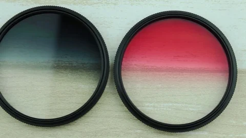 Four filters for a lens Stock Footage 80630776
