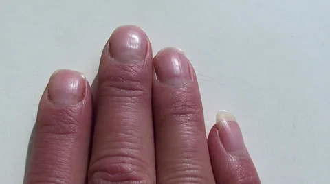 Four fingers on white Stock Footage 34817514