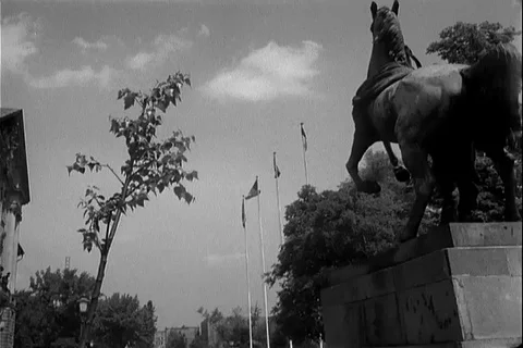 Four flags, Soviet, French, British and American fly from flagstaffs - 1953 Stock Footage 106052903