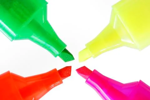 Four fluorescent highlighters with different colours Stock Photos