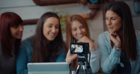 Four friends doing a vlog video together. Shot in slow motion Stock Footage 117185545