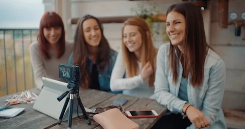 Four friends doing a vlog video together. Shot in slow motion Stock Footage 117185757