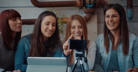 Four friends doing a vlog video together. Shot in slow motion Stock Footage 117185808