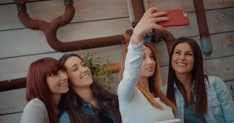 Four friends doing a vlog video together. Shot in slow motion Stock Footage 117186100