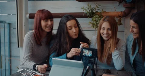 Four friends doing a vlog video together. Shot in slow motion Stock Footage 118069189