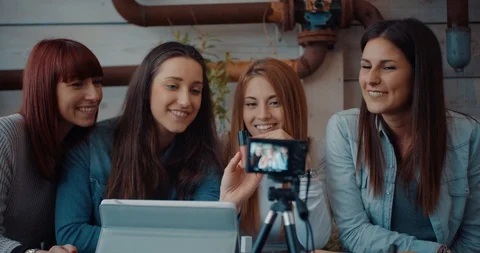 Four friends doing a vlog video together. Shot in slow motion Stock Footage 118069663