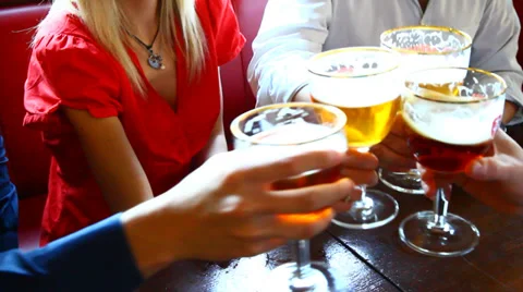 Four friends with a fresh beer Stock Footage 38716632