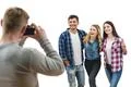 The four friends make a photo on the white background Photo