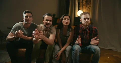 Four friends react on victory of their favorite team Video stock 108767623