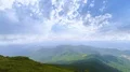 The four friends standing on the beautiful mountain 4k or 4k+ Resolution