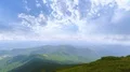 The four friends standing on the beautiful mountain 4k or 4k+ Resolution