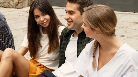 Four friends talking Stock-Footage 93836524