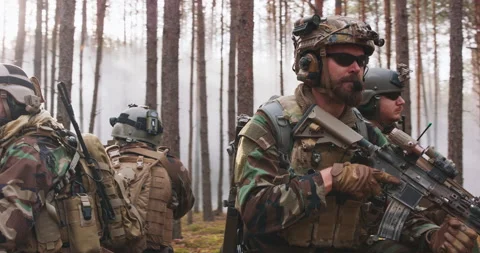 Four Fully Equipped Middle - Aged Soldiers Wearing Camouflage Uniform, They're Stock Footage 144236227