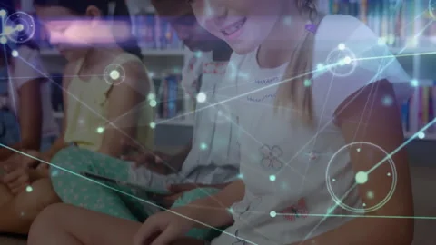 Four girls tapping tablets in library activating moving network visualization Stock Footage 312280603