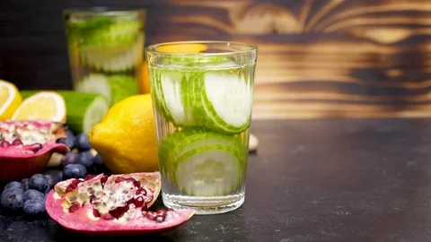 Four glasses with different type of vitamin water Stock Footage 89421149