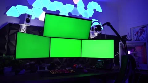 Four green screen monitors for editing and inserting videos inside. Stock Footage 305336180
