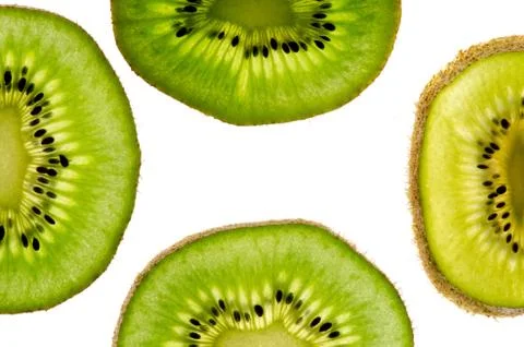 Four halfs of kiwi's sheets isolated on white background. Stock Photos