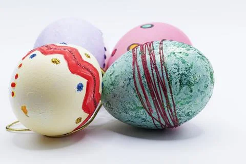 Four hand-painted Easter eggs on white background Stock Photos