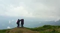 The four happy friends jumping on the mountain top 4k or 4k+ Resolution