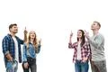 The four happy people gesture on the white background Photo
