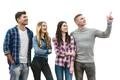 The four happy people stand on the white background Photo