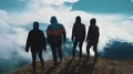 The four happy people standing on the mountain 4k or 4k+ Resolution
