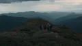 The four hikers standing on the beautiful mountain 4k or 4k+ Resolution